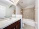 Bathroom with tub, shower, and dark vanity at 812 Park Grove Ct, Orlando, FL 32828