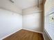 Bright walk-in closet with wire shelving and window at 812 Park Grove Ct, Orlando, FL 32828