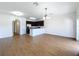 Bright dining room with hardwood floors and kitchen view at 812 Park Grove Ct, Orlando, FL 32828