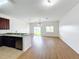 Bright dining room with hardwood floors and view to the lake at 812 Park Grove Ct, Orlando, FL 32828