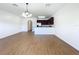 Bright dining room with hardwood floors and a chandelier at 812 Park Grove Ct, Orlando, FL 32828