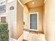 Gray front door and a brick pathway leading to the entrance at 812 Park Grove Ct, Orlando, FL 32828