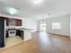 Kitchen with stainless steel appliances and light wood cabinets at 812 Park Grove Ct, Orlando, FL 32828