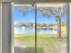 Stunning lake view from sliding glass doors at 812 Park Grove Ct, Orlando, FL 32828
