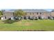 Rear view of townhouses with spacious yards at 812 Park Grove Ct, Orlando, FL 32828