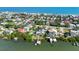 Aerial view showing home's location in a beachside neighborhood at 830 Garfish Ave, New Smyrna Beach, FL 32169