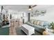 Open concept living area with kitchen and coastal decor at 830 Garfish Ave, New Smyrna Beach, FL 32169