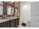 Bathroom with double vanity and granite countertop at 8567 Baywood Vista Dr, Orlando, FL 32810