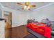 Bedroom with a double bed and access to another room at 8567 Baywood Vista Dr, Orlando, FL 32810