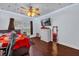 Bedroom with a double bed, dresser, and full-length mirror at 8567 Baywood Vista Dr, Orlando, FL 32810