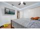 Bedroom with a double bed and large TV at 8567 Baywood Vista Dr, Orlando, FL 32810