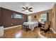 Bedroom with a queen bed and ceiling fan at 8567 Baywood Vista Dr, Orlando, FL 32810
