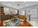 Bright dining area with hardwood floors and modern furnishings at 8567 Baywood Vista Dr, Orlando, FL 32810