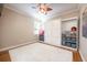 Bedroom with a murphy bed, built-in storage, and hardwood floors at 863 Strathmore Dr, Orlando, FL 32803
