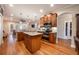 Large kitchen with granite countertops, stainless steel appliances, and hardwood floors at 863 Strathmore Dr, Orlando, FL 32803