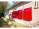 Exterior view showcasing four Tesla Powerwall units providing sustainable energy at 863 Strathmore Dr, Orlando, FL 32803