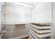 Spacious walk-in closet with custom shelving and drawers at 863 Strathmore Dr, Orlando, FL 32803