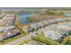 Community overview with lake and homes at 906 Coral Reef Way, Daytona Beach, FL 32124