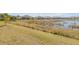 Spacious backyard with pond and community views at 906 Coral Reef Way, Daytona Beach, FL 32124