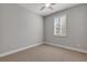 Bedroom with carpet flooring and window shutters at 906 Coral Reef Way, Daytona Beach, FL 32124
