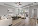 Spacious living room with large windows and access to a patio at 906 Coral Reef Way, Daytona Beach, FL 32124