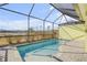 Inviting screened pool with a spacious deck at 906 Coral Reef Way, Daytona Beach, FL 32124