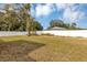 Large backyard with fenced perimeter and mature trees at 10 Cedar Tree Dr, Ocala, FL 34472