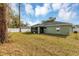Spacious backyard with a large green lawn area at 10 Cedar Tree Dr, Ocala, FL 34472
