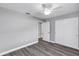 Bright bedroom with double doors and ceiling fan at 10 Cedar Tree Dr, Ocala, FL 34472