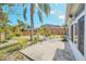 Landscaped backyard with patio and fountain at 10125 Foxhurst Ct, Orlando, FL 32836