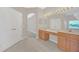Double vanity bathroom with updated cabinets and large mirror at 10125 Foxhurst Ct, Orlando, FL 32836