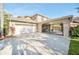 Two-car garage with a gated access to backyard at 10125 Foxhurst Ct, Orlando, FL 32836