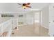 Bright loft overlooking main floor with ceiling fan and access to bedrooms at 10125 Foxhurst Ct, Orlando, FL 32836