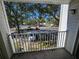 Private balcony with a view of the parking lot at 11526 Westwood Blvd # 725, Orlando, FL 32821