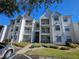 Two-story building with white siding and red roof at 11526 Westwood Blvd # 725, Orlando, FL 32821