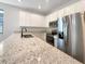 Modern kitchen with stainless steel appliances and granite countertops at 1162 Atlantic Ave, Fruitland Park, FL 34731