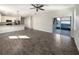 Open concept living area with tile flooring and sliding doors at 1162 Atlantic Ave, Fruitland Park, FL 34731