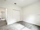 Bright bedroom with plush carpet and double door closet at 13566 Sw 79Th Terrace Rd, Ocala, FL 34473