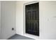 Modern black front door welcomes you to this new home at 13566 Sw 79Th Terrace Rd, Ocala, FL 34473