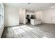 Modern kitchen with white cabinets and stainless steel appliances at 13566 Sw 79Th Terrace Rd, Ocala, FL 34473