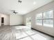 Spacious living area with tile flooring and lots of natural light at 13566 Sw 79Th Terrace Rd, Ocala, FL 34473