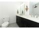 Modern bathroom with double vanity, designer tile, and updated fixtures at 1552 East Blvd, Maitland, FL 32751