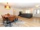 Bright dining area with a live edge wood table and modern chairs at 1552 East Blvd, Maitland, FL 32751