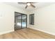Spacious bedroom with sliding glass doors leading to the pool area at 1633 Cedar Glen Dr, Apopka, FL 32712