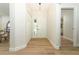 Light and airy entryway with wood-look floors and ample closet space at 1633 Cedar Glen Dr, Apopka, FL 32712