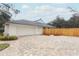 Attached two-car garage with paver driveway at 1633 Cedar Glen Dr, Apopka, FL 32712