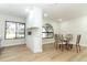 Bright kitchen with white cabinets, quartz countertops, and stainless steel appliances at 1633 Cedar Glen Dr, Apopka, FL 32712