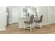 Kitchen features a breakfast bar with two modern barstools at 1633 Cedar Glen Dr, Apopka, FL 32712