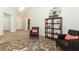 Cozy living room with wood floors, comfy seating, and decorative rug at 1633 Cedar Glen Dr, Apopka, FL 32712