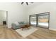 Living area with sliding doors opening to a view of the pool and backyard at 1633 Cedar Glen Dr, Apopka, FL 32712